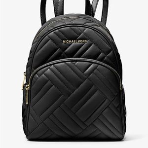 Pre loved Michael Kors black backpack